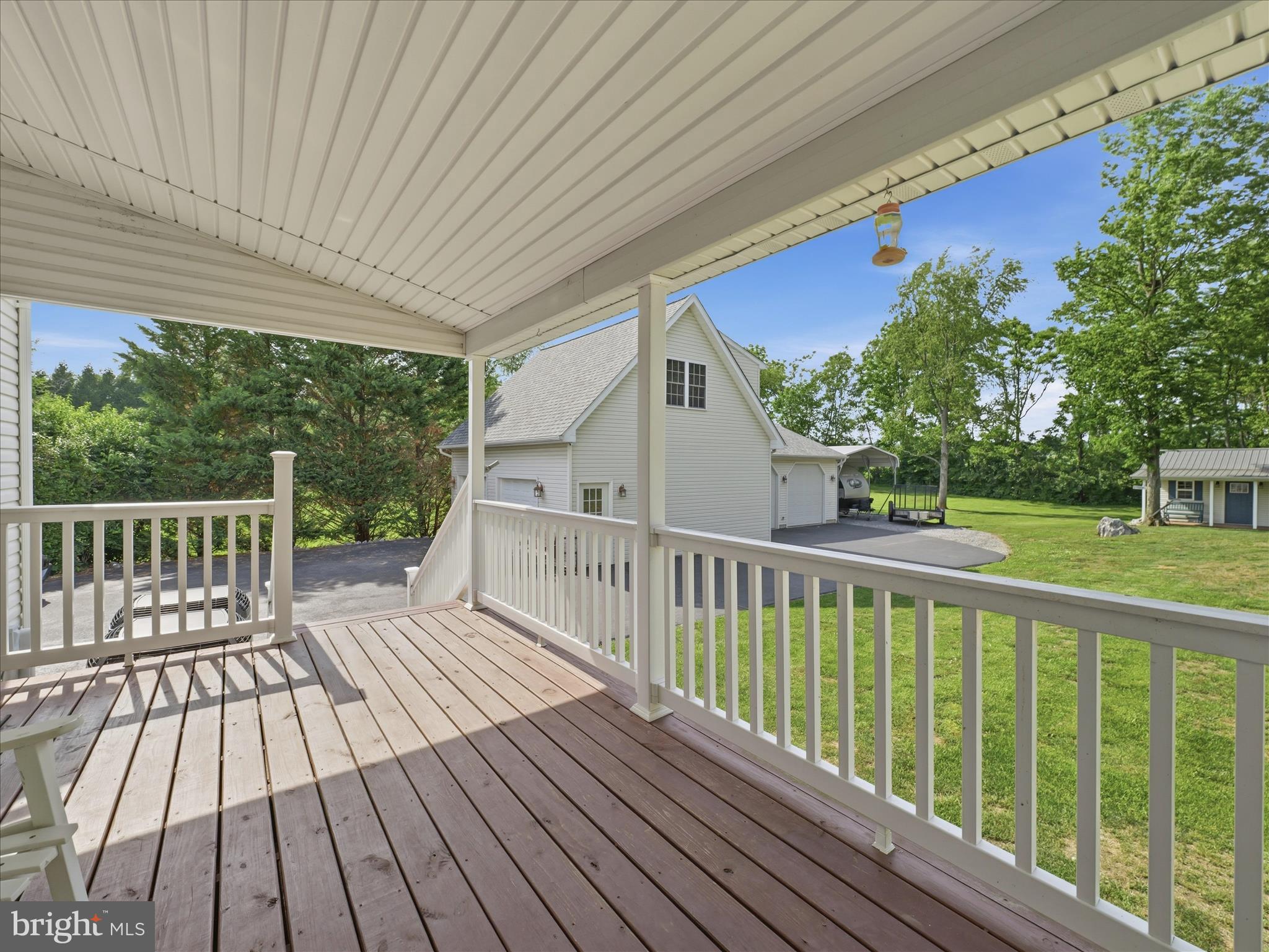 726 Doe Run Road Inwood, WV 25428 - Photo 15 of 68 a view of balcony with wooden floor and fence
