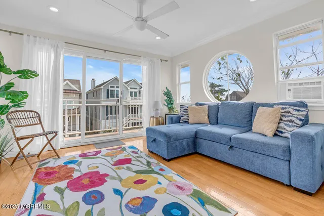 an aerial view of a house with a swimming pool