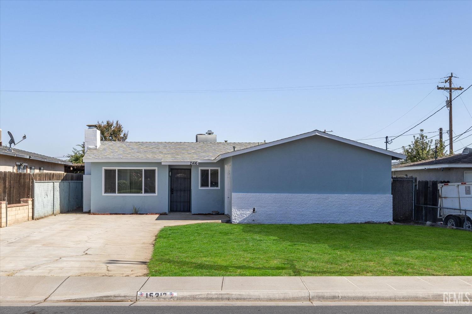 Undisclosed Address Bakersfield, CA 93312 - Photo 1 of 23 a front view of a house with a garden