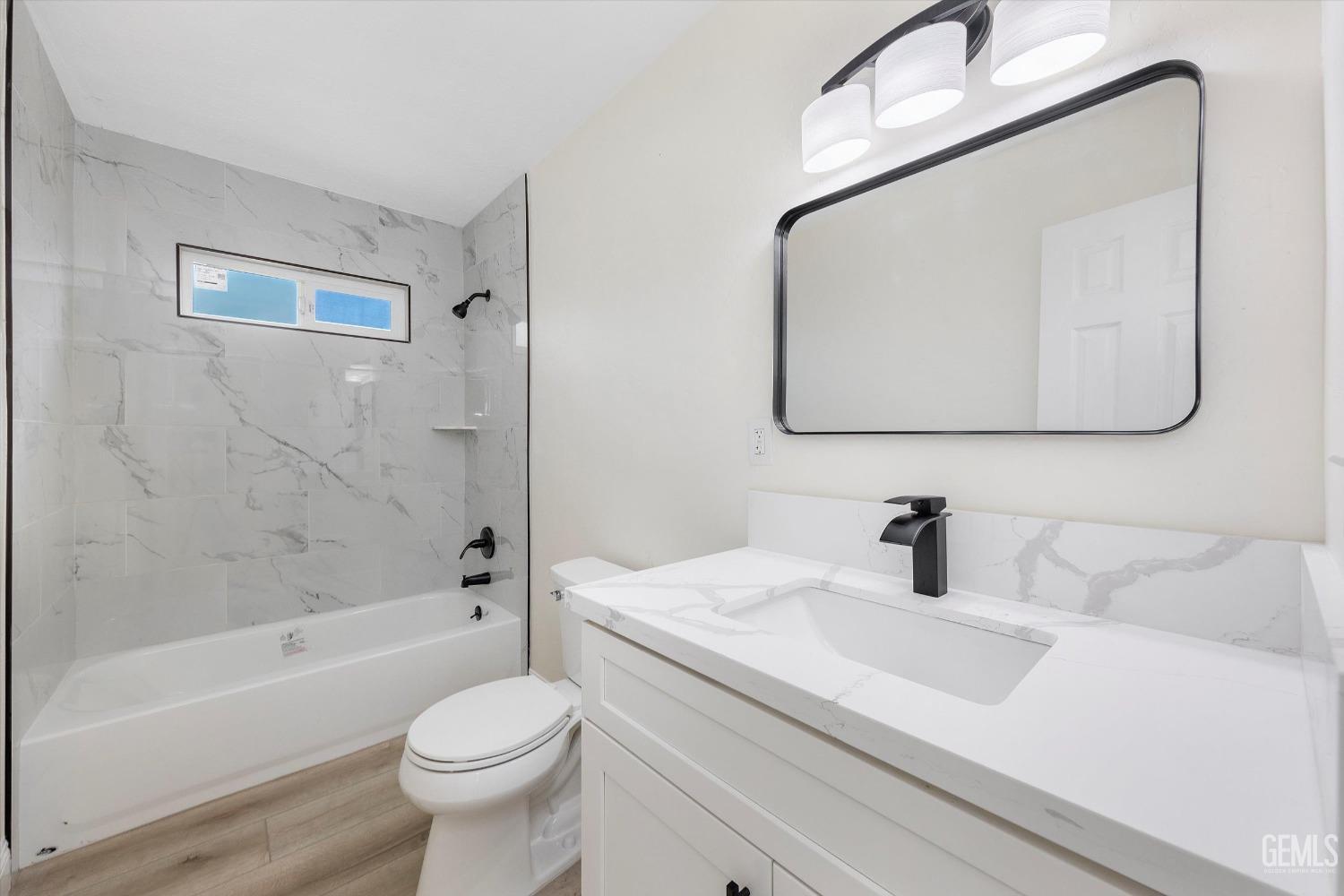 Undisclosed Address Bakersfield, CA 93312 - Photo 20 of 23 a bathroom with a sink toilet and shower