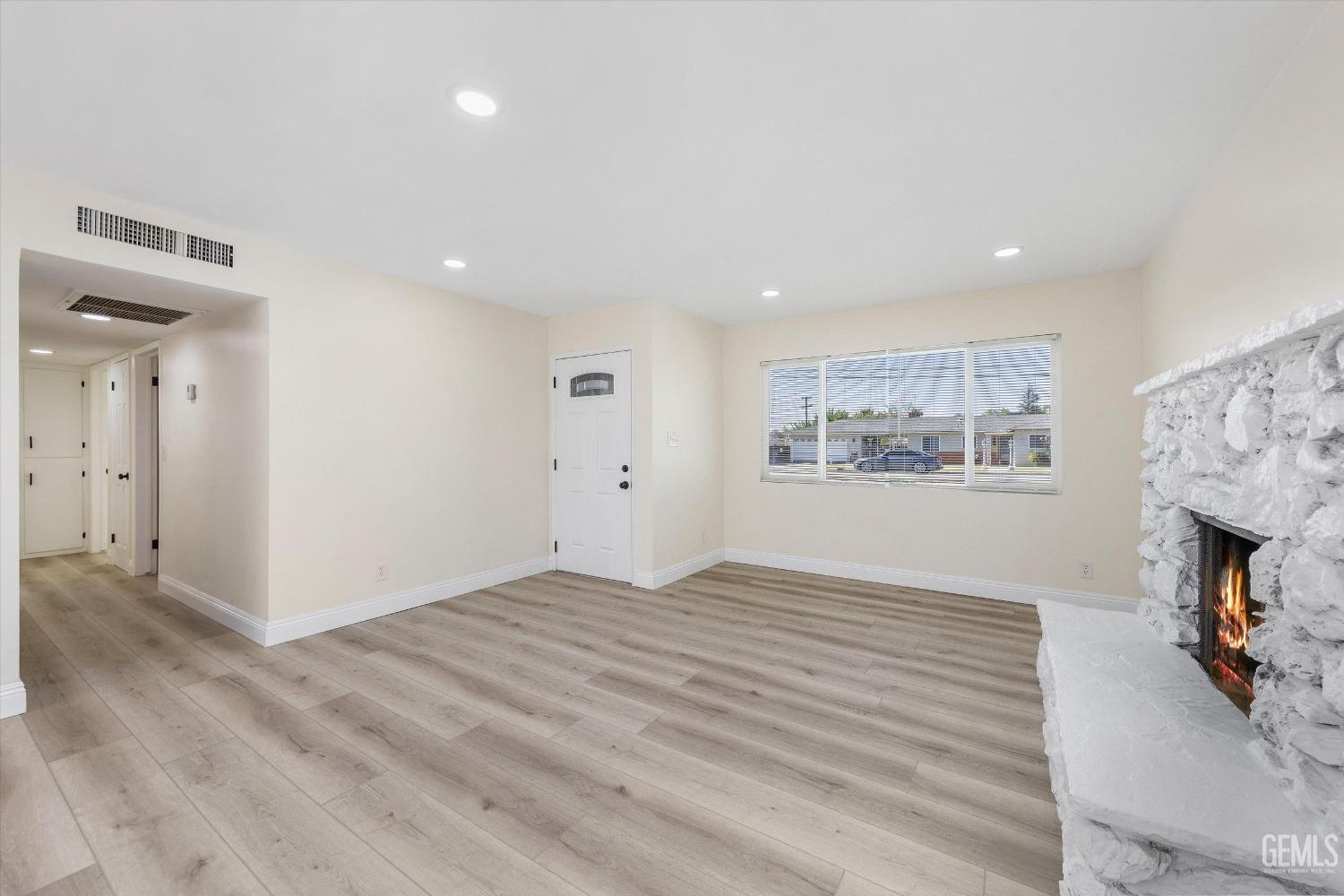 Undisclosed Address Bakersfield, CA 93312 - Photo 8 of 23 a view of an empty room with a window