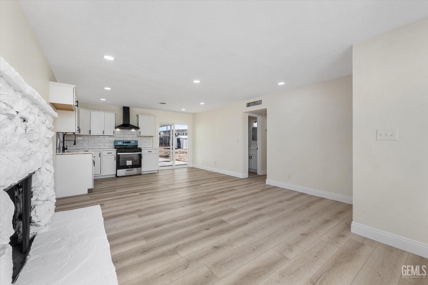 Undisclosed Address Bakersfield, CA 93312 - Photo 9 of 23 a view of kitchen view with wooden floor