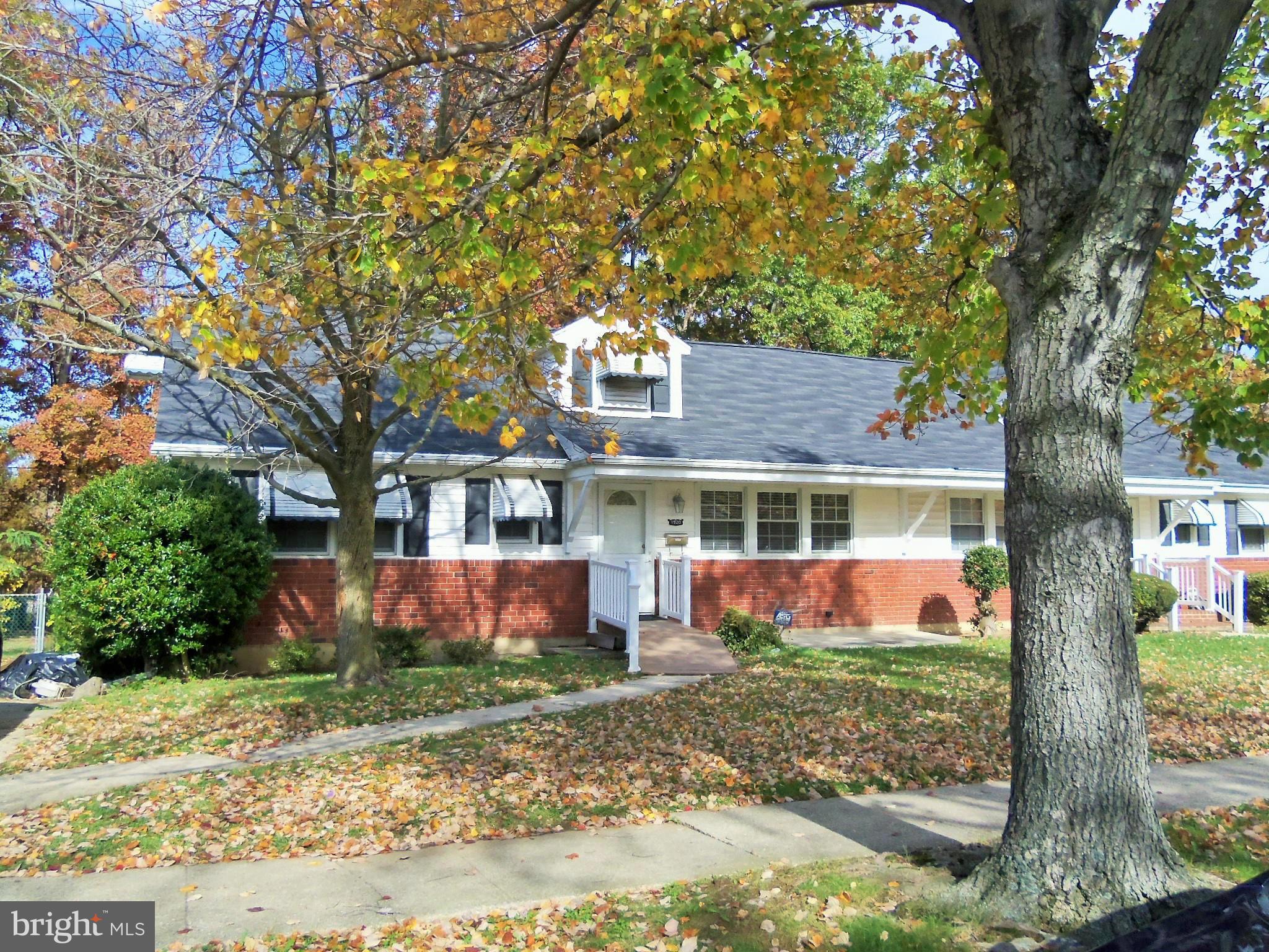 1920 Brookdale Road Baltimore, MD 21244 - Photo 1 of 22 front view of house with a yard