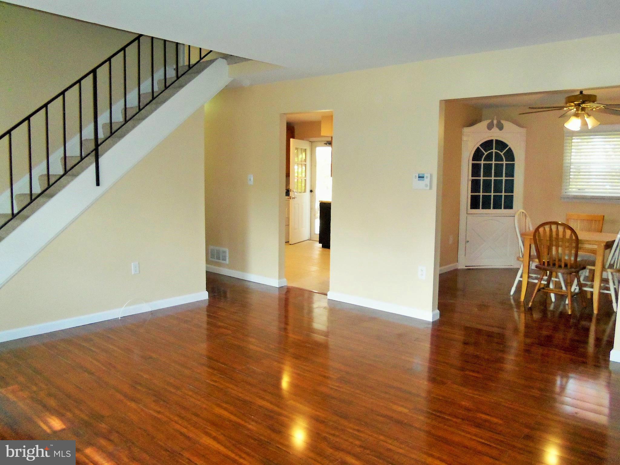 1920 Brookdale Road Baltimore, MD 21244 - Photo 2 of 22 a view of an entryway with wooden floor