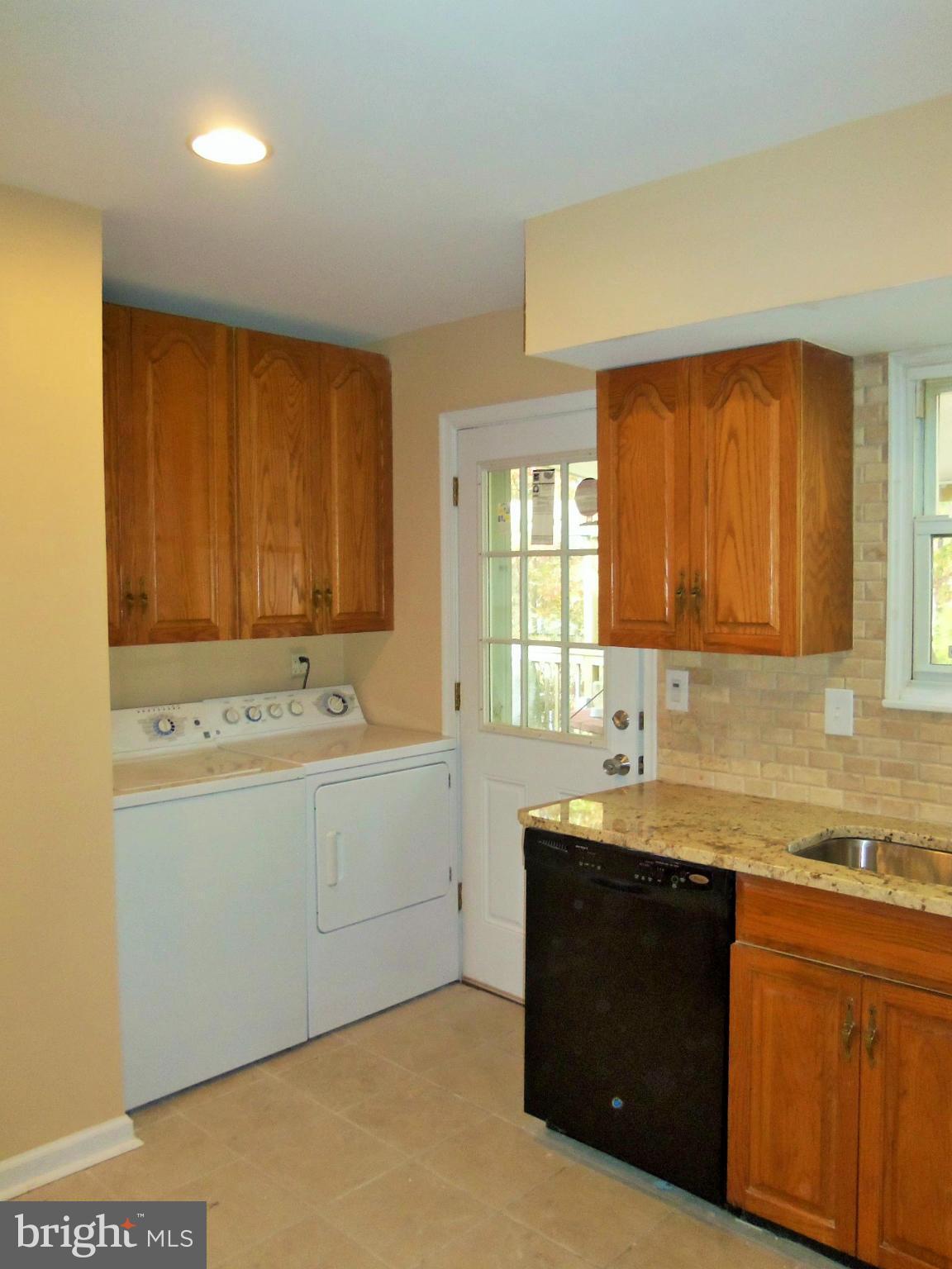 1920 Brookdale Road Baltimore, MD 21244 - Photo 11 of 22 a bathroom with a sink and a mirror