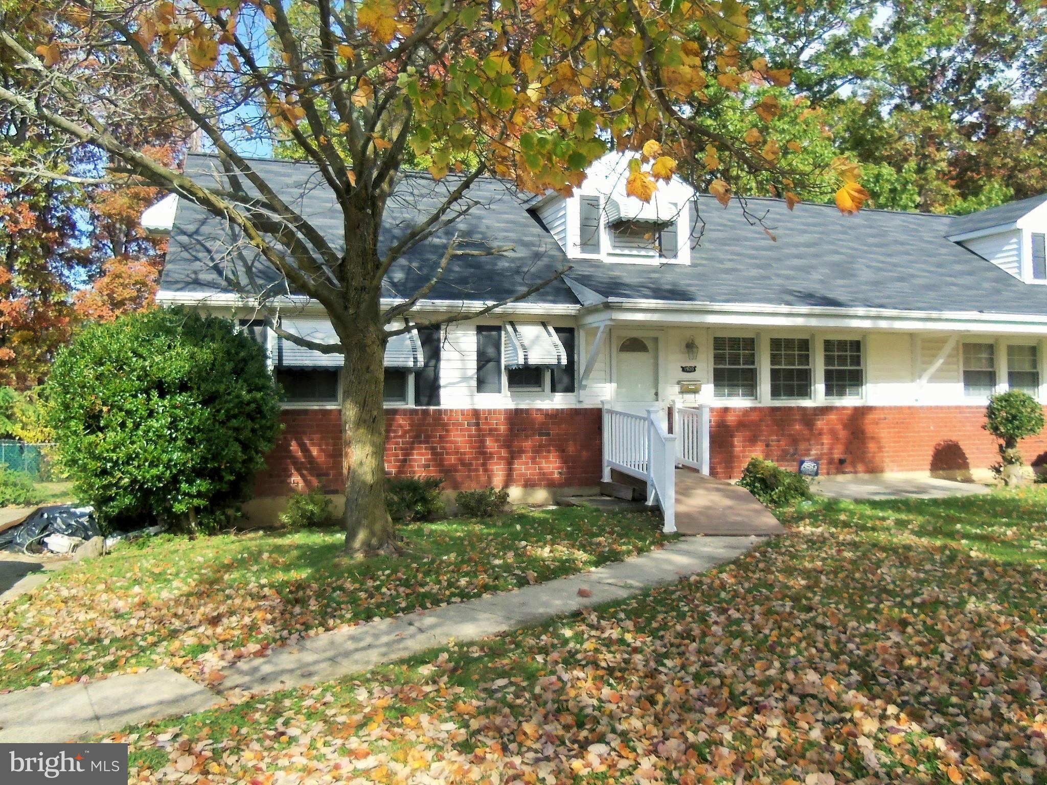 1920 Brookdale Road Baltimore, MD 21244 - Photo 22 of 22 front view of a house with a yard