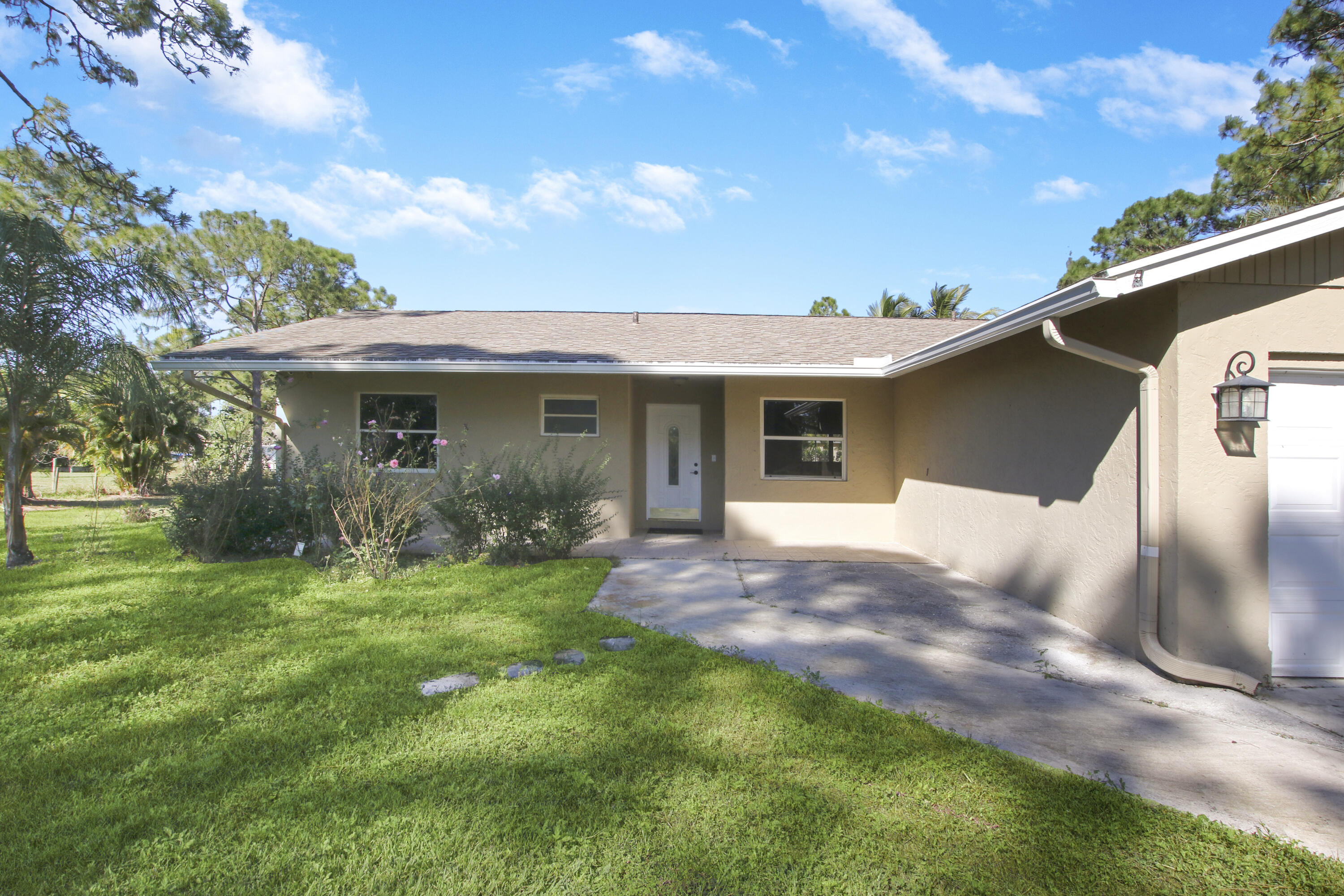 13635 86th Road North The Acreage, FL 33412 - Photo 2 of 33 359DA1B4-7753-497B-B18A-F2B4ED344674