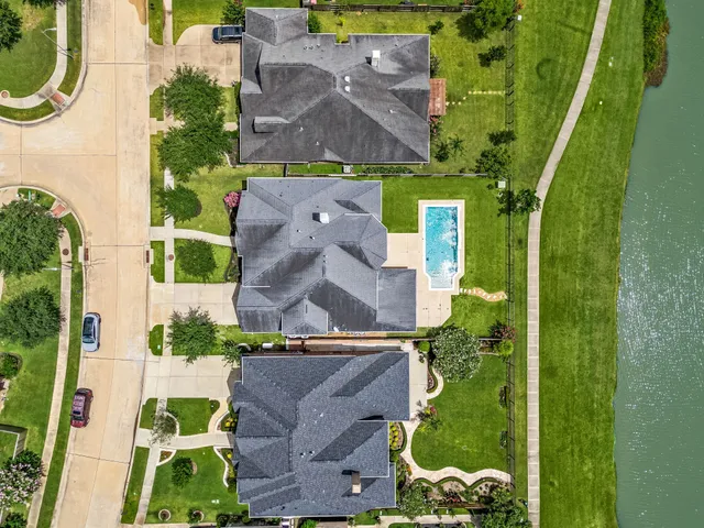 an aerial view of a house with a garden