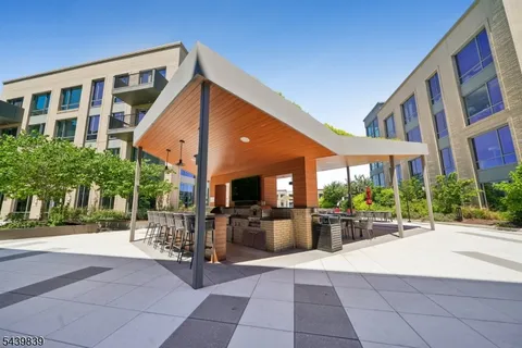 a view of a building with a patio