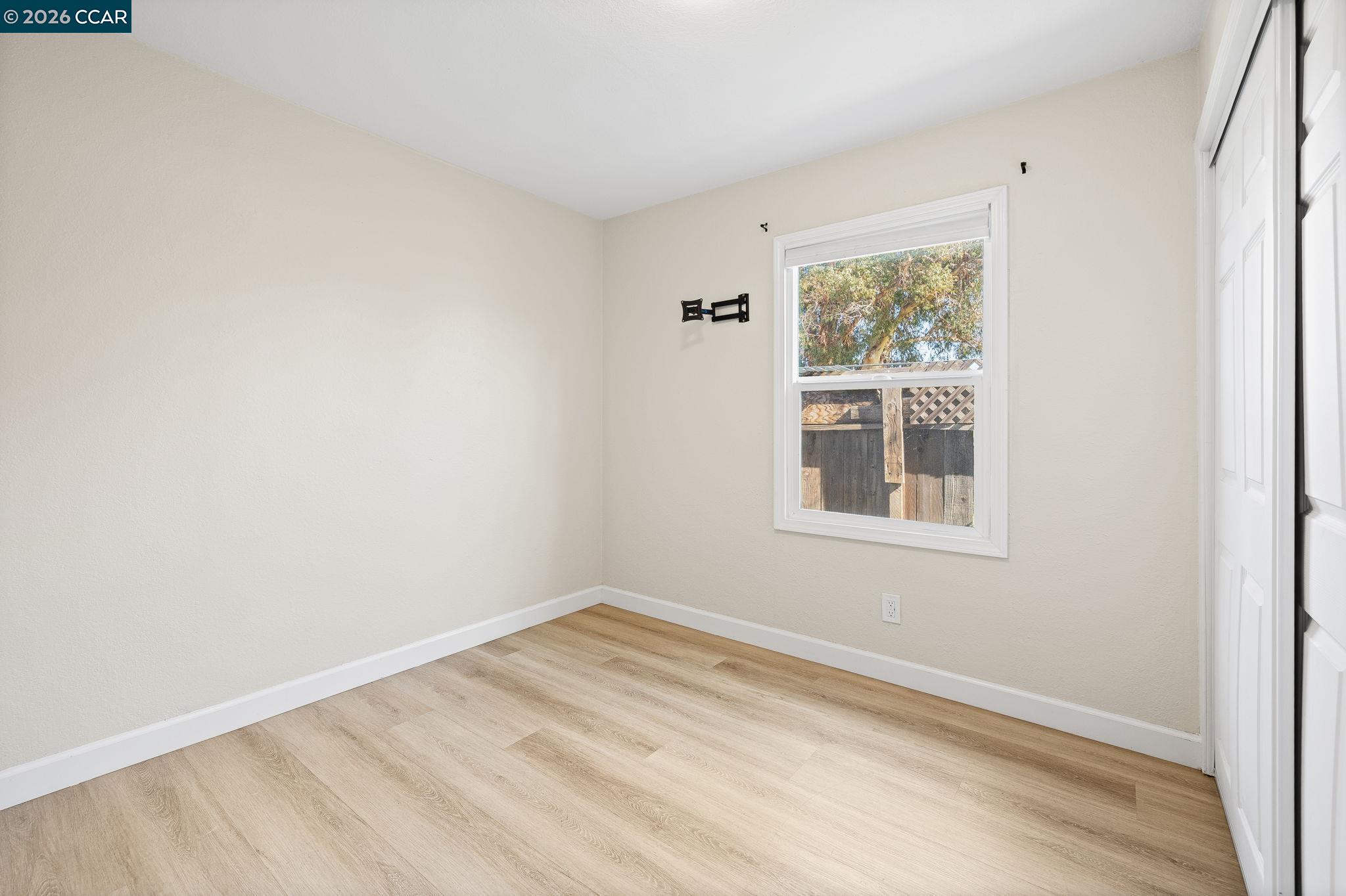 4820 Blum Road Martinez, CA 94553 - Photo 16 of 46 an empty room with a window