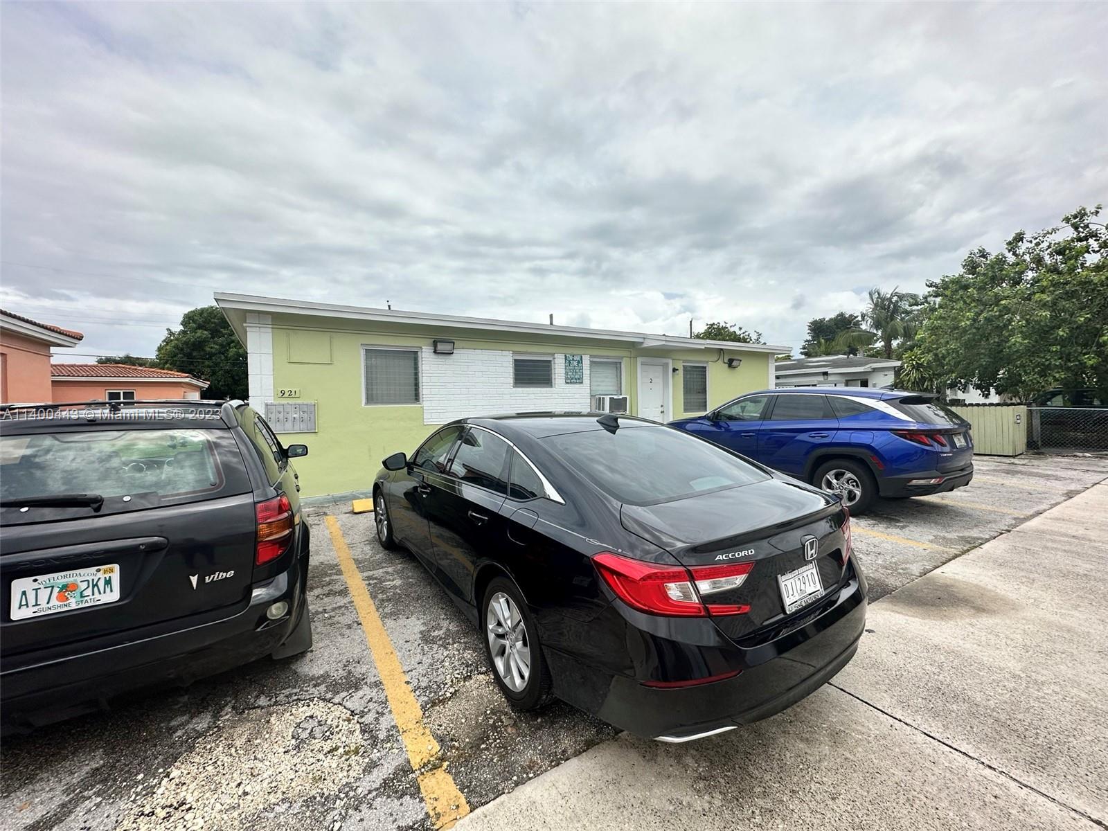 West Flagler Miami, FL 33125 - Photo 14 of 14 a car parked in front of a house