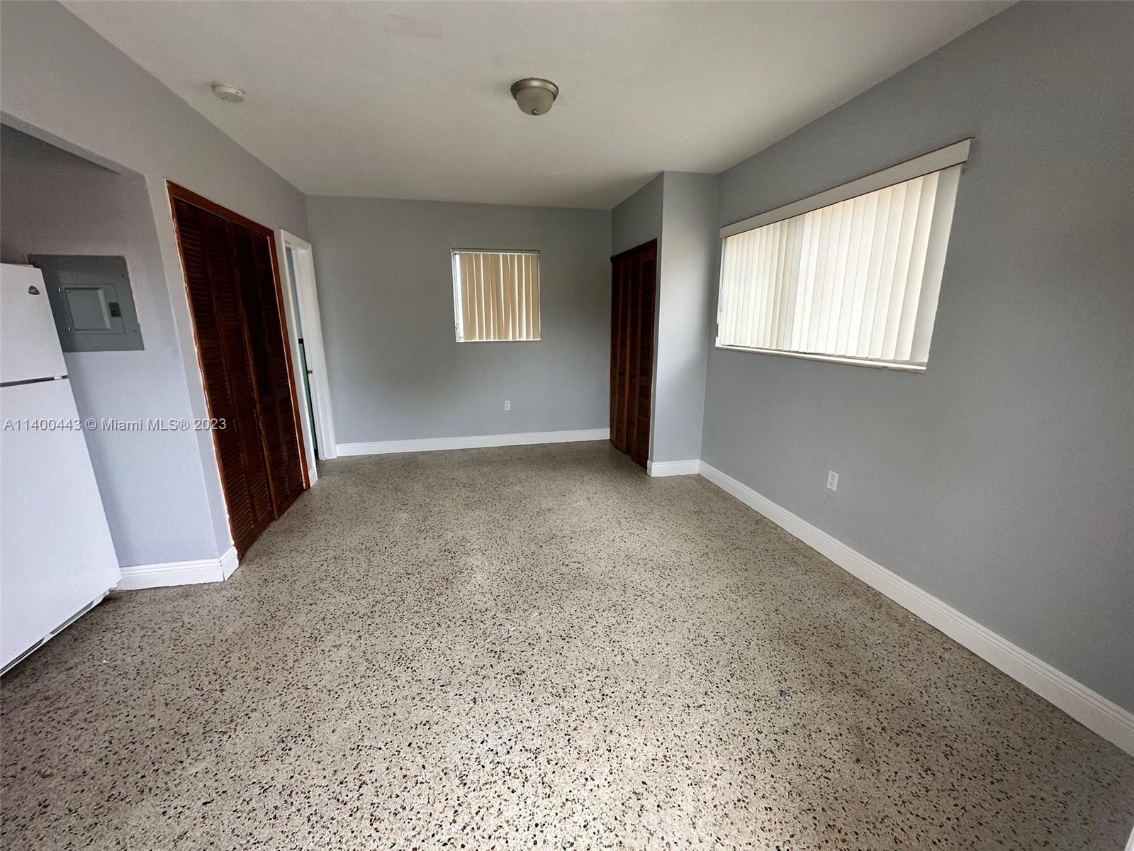 West Flagler Miami, FL 33125 - Photo 4 of 14 a view of an empty room with a window