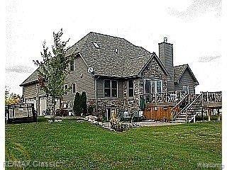 59953 9 Mile Road South Lyon, MI 48178 - Photo 14 of 17 REAR VIEW OF HOUSE