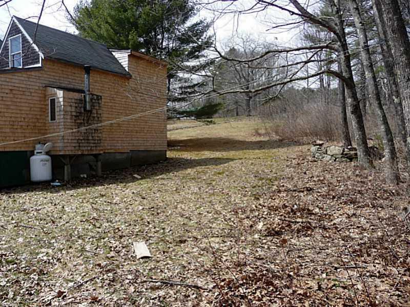 14 Gould Road Jefferson, ME 04348 - Photo 15 of 29 Exterior Back. Note doghouse housing...