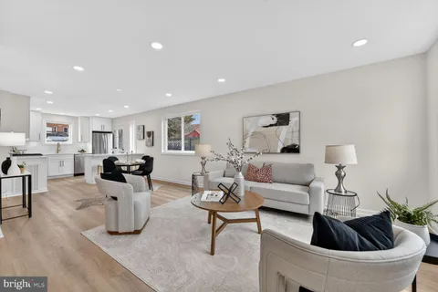 a very nice looking living room with a large window
