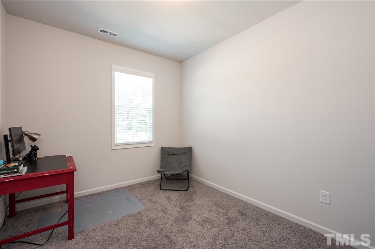 3620 Buffaloe Road Raleigh, NC 27604 - Photo 15 of 18 a room with a window