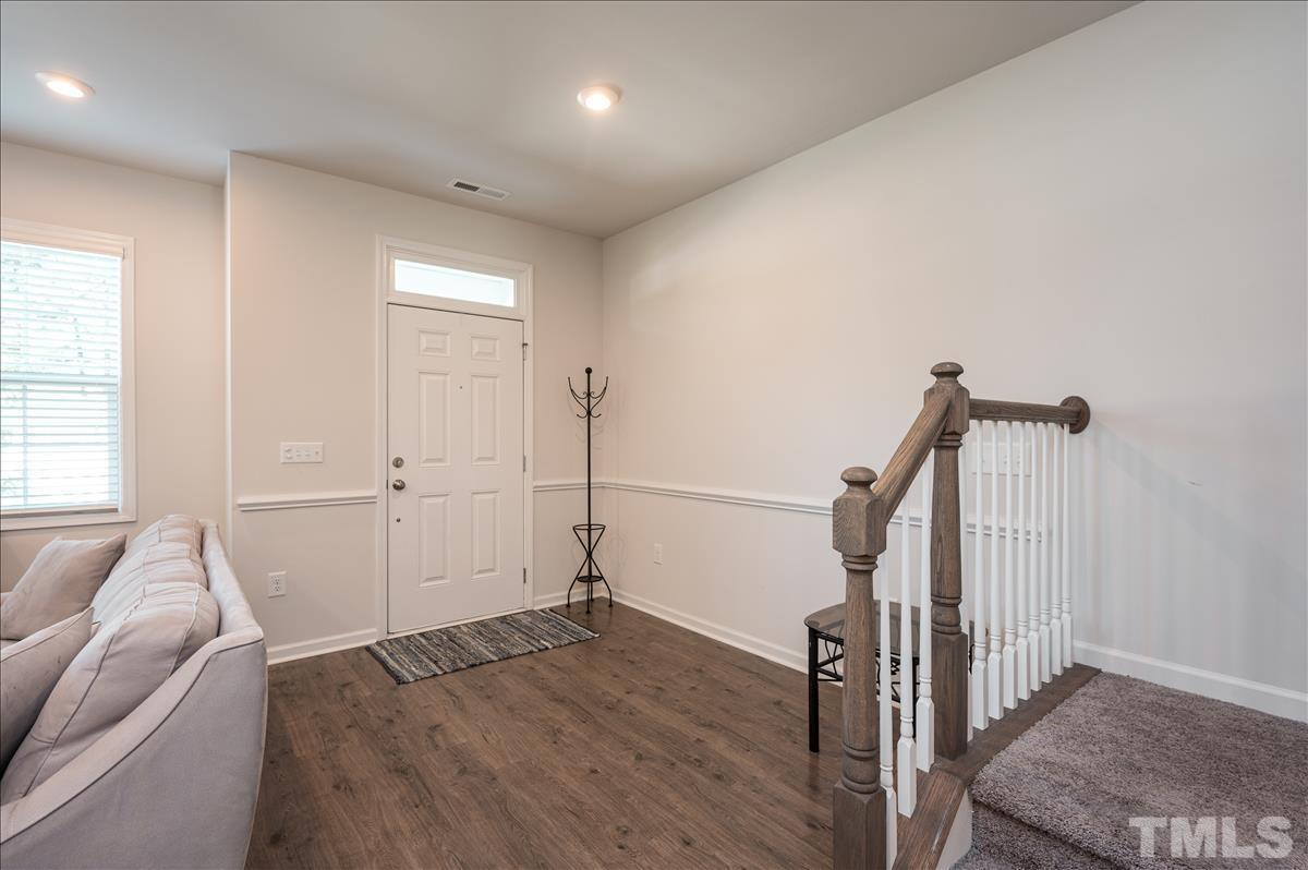 3620 Buffaloe Road Raleigh, NC 27604 - Photo 3 of 18 a view of a livingroom with a hardwood floor