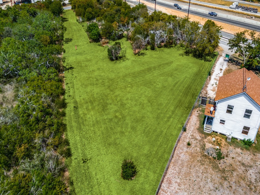 12170 Interstate 10 Converse, TX 78109 - Photo 11 of 13 a view of a house with a yard