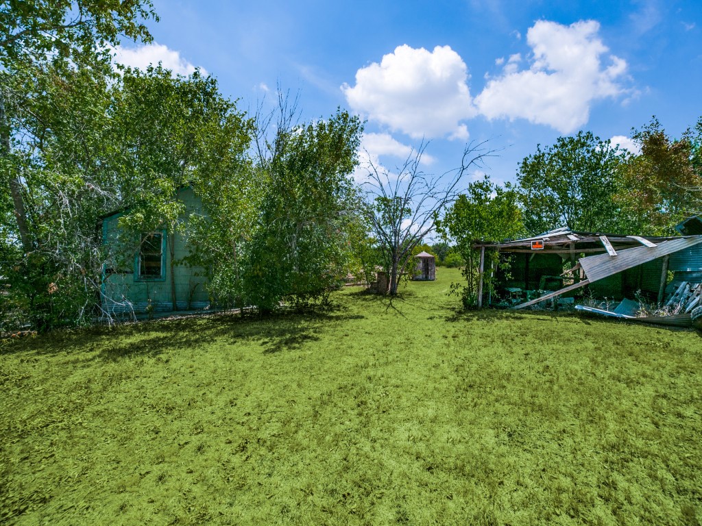 12170 Interstate 10 Converse, TX 78109 - Photo 3 of 13 a backyard of a house with lots of green space