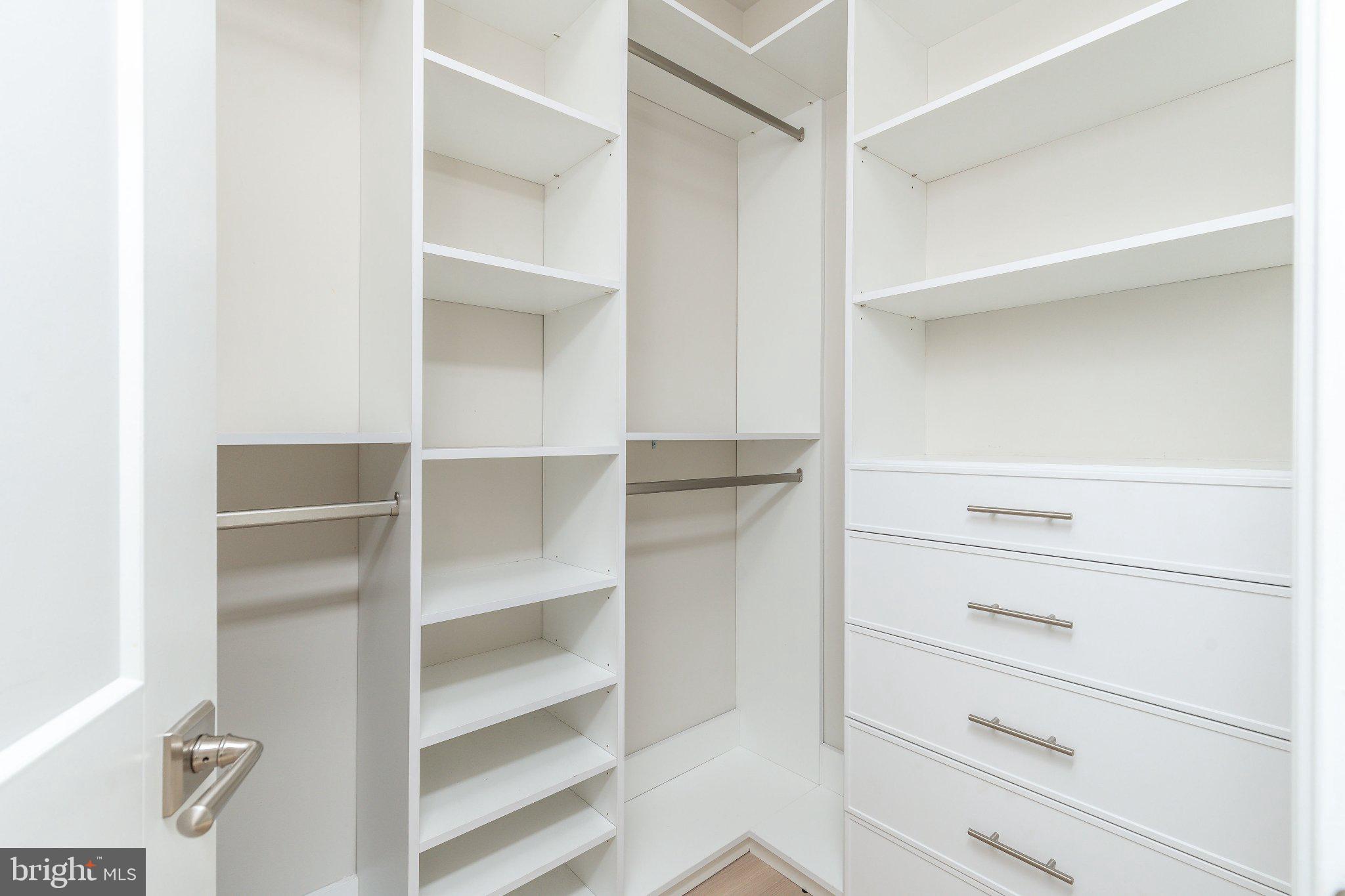 206 North Aberdeen Avenue, Unit D Wayne, PA 19087 - Photo 19 of 36 Sleek, modern closet with ample storage.