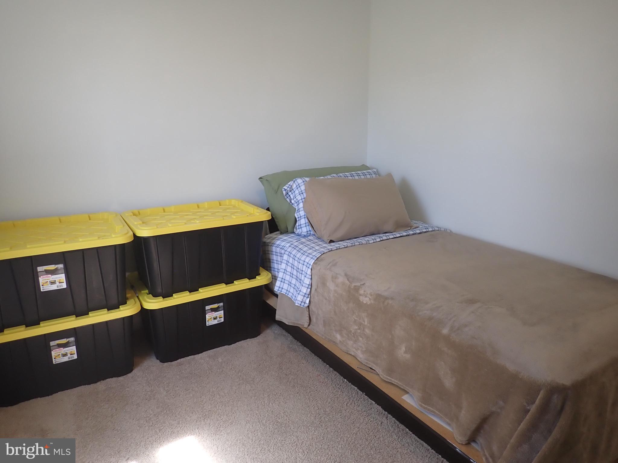 16 Cold Stream Drive Lancaster, PA 17603 - Photo 11 of 23 a bed sitting in a bedroom next to a window