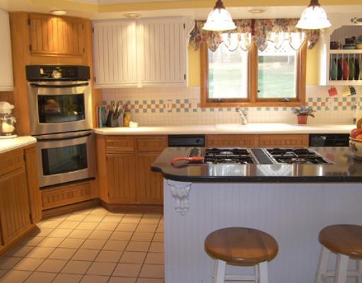 110 Vander Road Wexford, PA 15090 - Photo 3 of 8 Kitchen. Many features:Oak cabinets, Corian countertops, Quartz Island counter, stainless steel double ovens, new stainless refrigerator ( 07) Bosch dishwasher (only 4 years old) trash compactor.