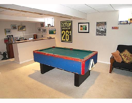 110 Vander Road Wexford, PA 15090 - Photo 7 of 8 Den/Family/Great Room. Finished game room boasts recessed lighting, dry bar and second powder room with ceramic floor.