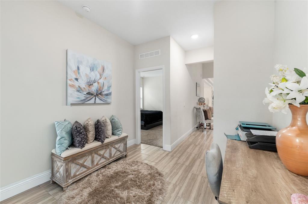 5615 Southwest 215th Terrace Newberry, FL 32669 - Photo 26 of 45 a living room with furniture and a fireplace