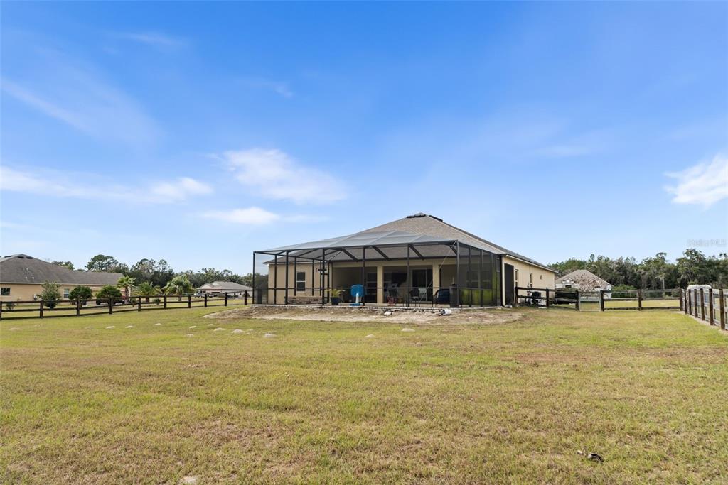 5615 Southwest 215th Terrace Newberry, FL 32669 - Photo 40 of 45 a front view of a house with a ocean view