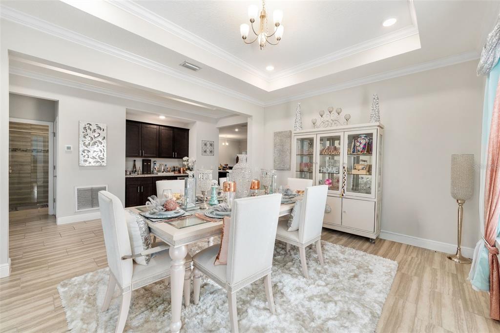5615 Southwest 215th Terrace Newberry, FL 32669 - Photo 9 of 45 a view of a dining room with furniture window and wooden floor