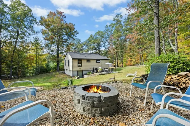 a view of a swimming pool and lounge chair