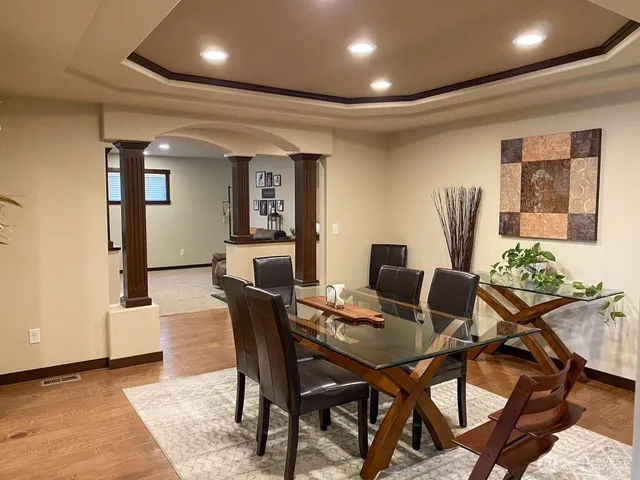 a view of a dining room with furniture