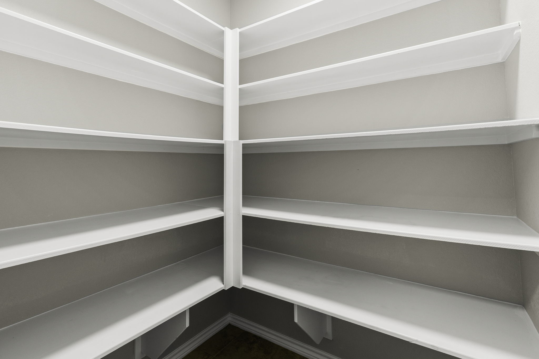 231 North Point Road Trinity, TX 75862 - Photo 14 of 50 a view of walk in closet with empty racks