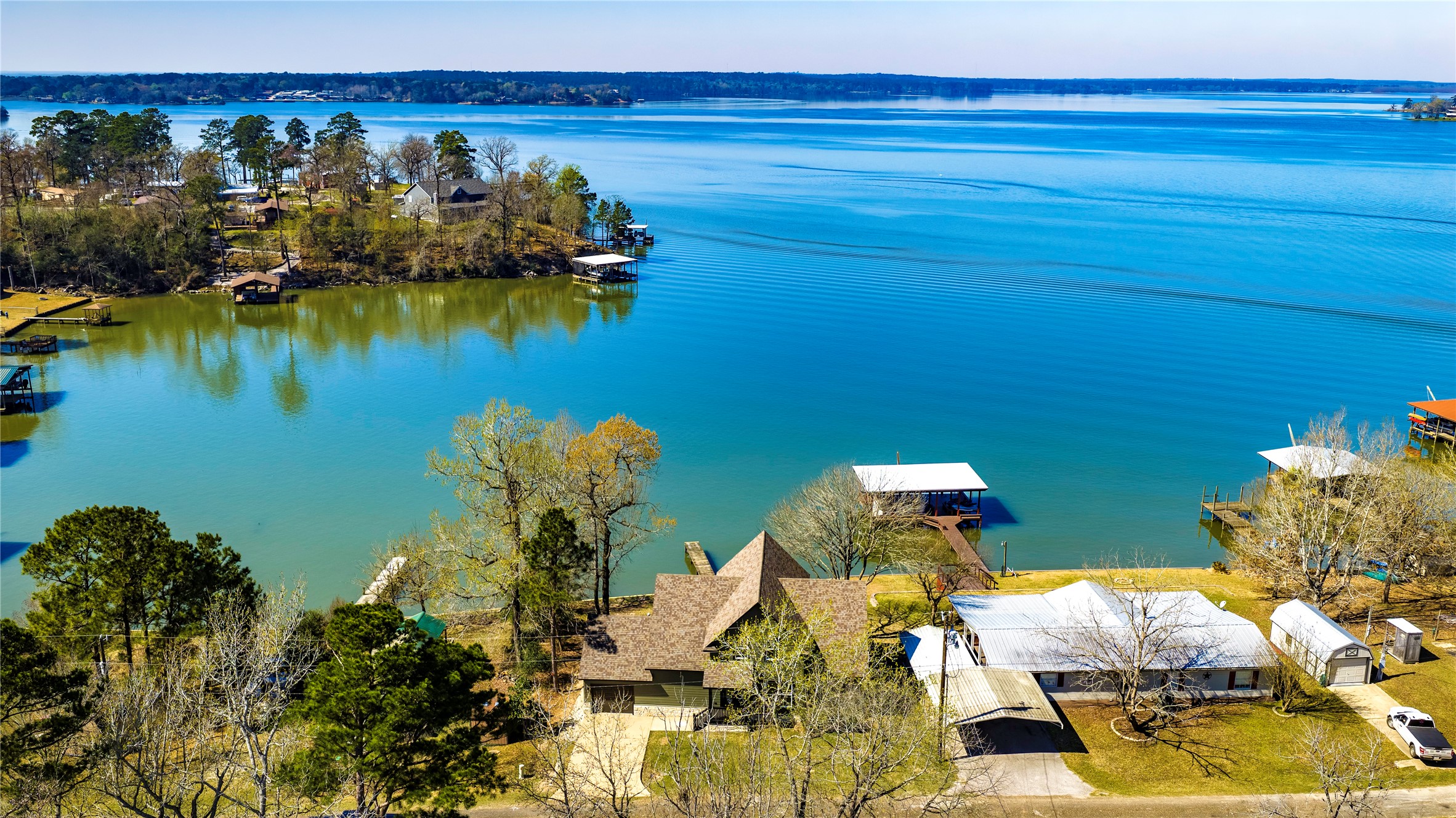 231 North Point Road Trinity, TX 75862 - Photo 3 of 50 a view of a lake with a house
