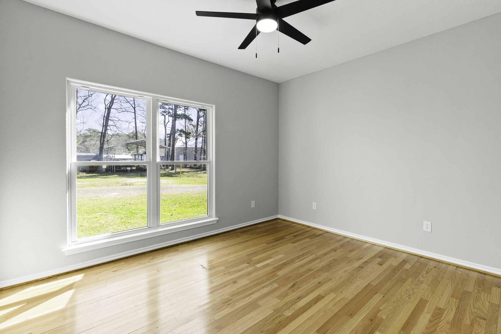 231 North Point Road Trinity, TX 75862 - Photo 31 of 50 a view of an empty room with a window