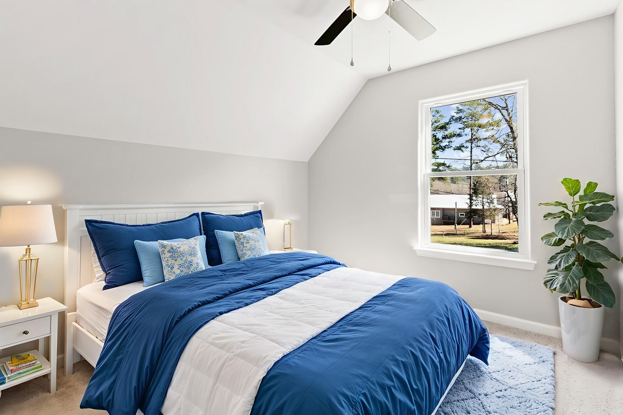 231 North Point Road Trinity, TX 75862 - Photo 39 of 50 a bedroom with bed and a window