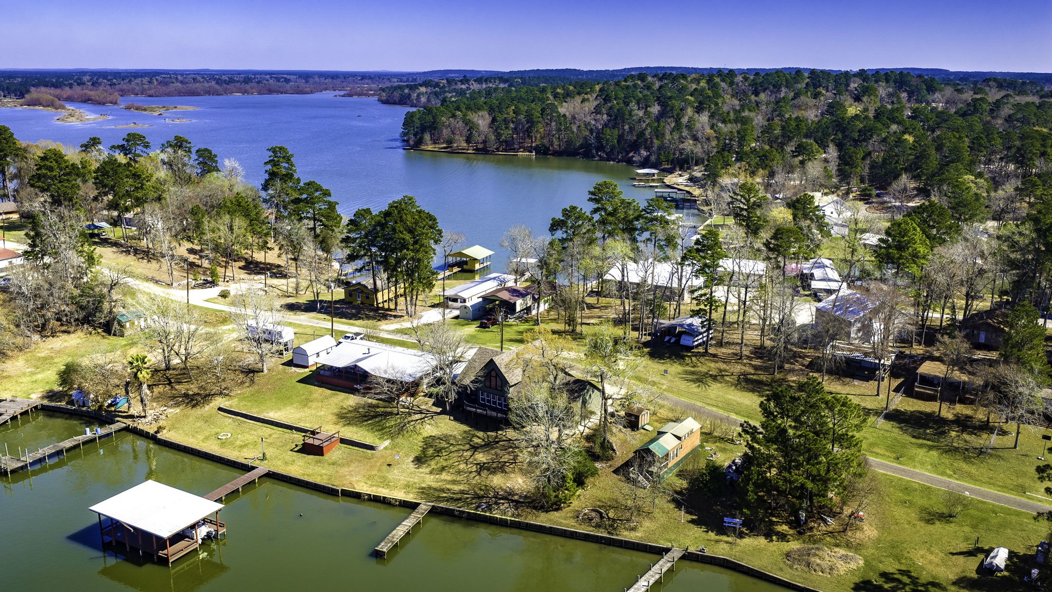 231 North Point Road Trinity, TX 75862 - Photo 47 of 50 view of a lake with houses