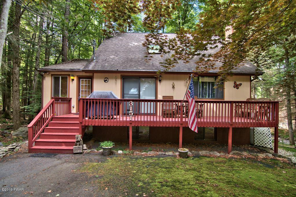 3151 Northgate Road Lake Ariel, PA 18436 - Photo 53 of 68 a view of a house with a small yard and wooden fence