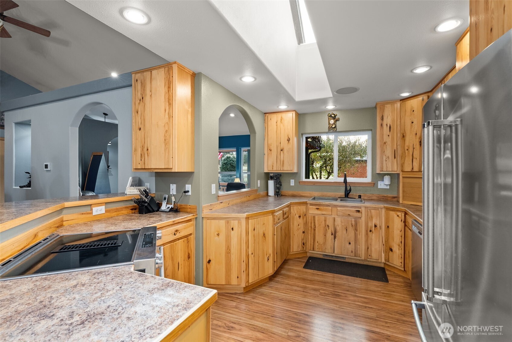 207 Ramsaur Road Centralia, WA 98531 - Photo 11 of 40 a large kitchen with stainless steel appliances granite countertop a sink and cabinets