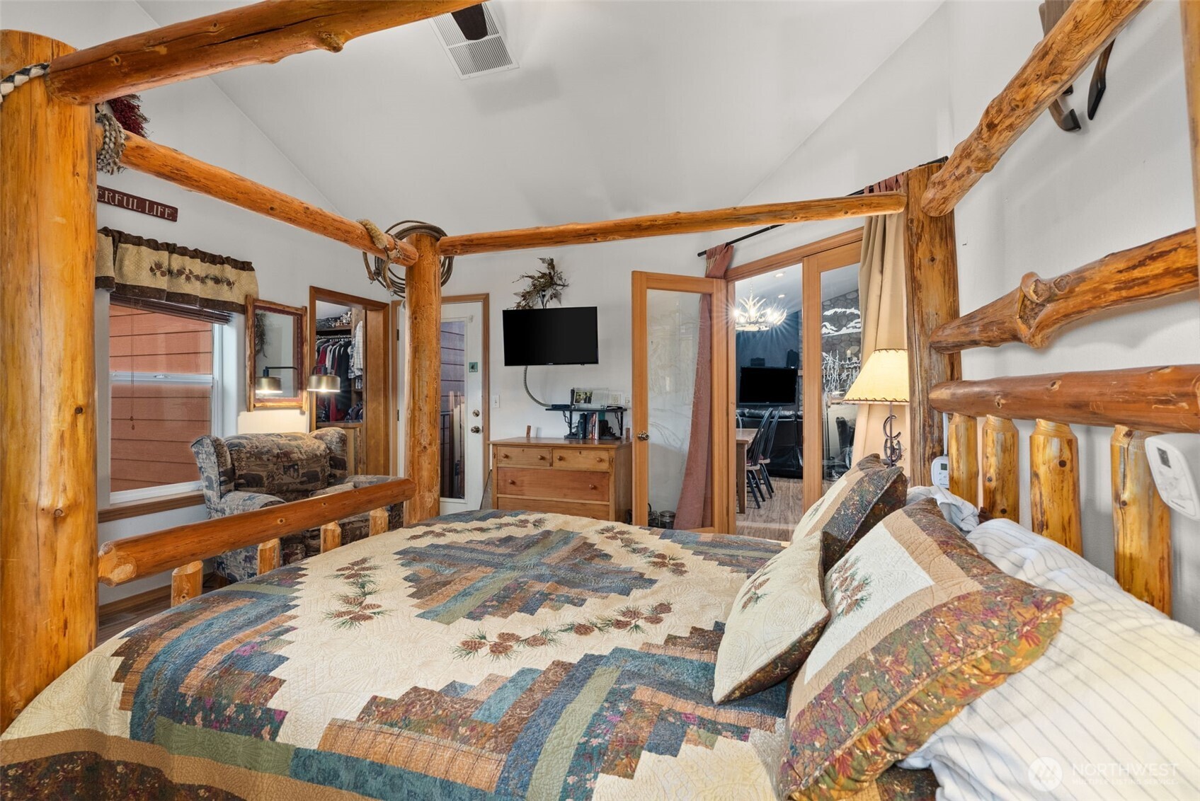 207 Ramsaur Road Centralia, WA 98531 - Photo 15 of 40 a bed room with a bed and a large mirror on the dresser