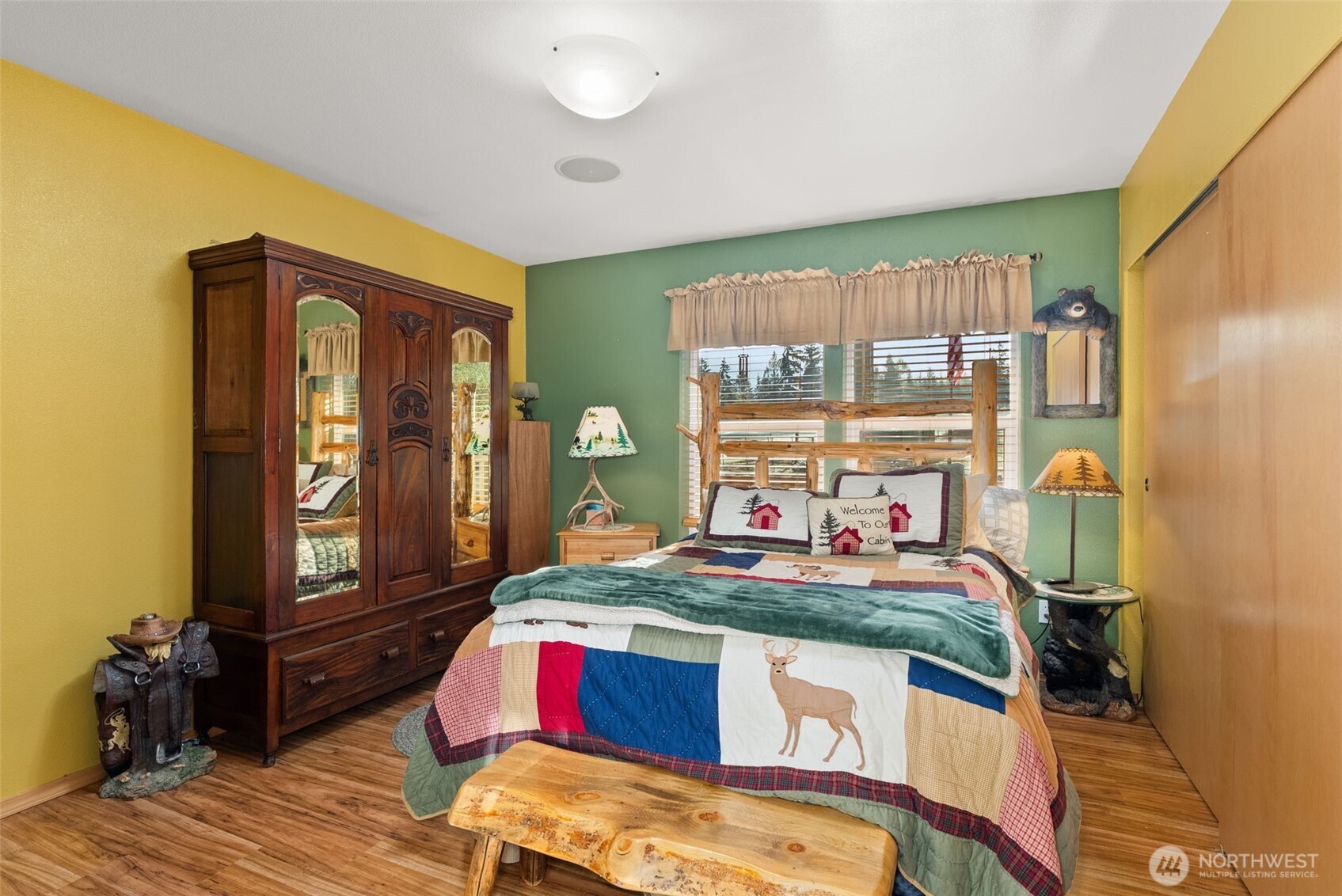 207 Ramsaur Road Centralia, WA 98531 - Photo 19 of 40 a bedroom with bed and wooden floor