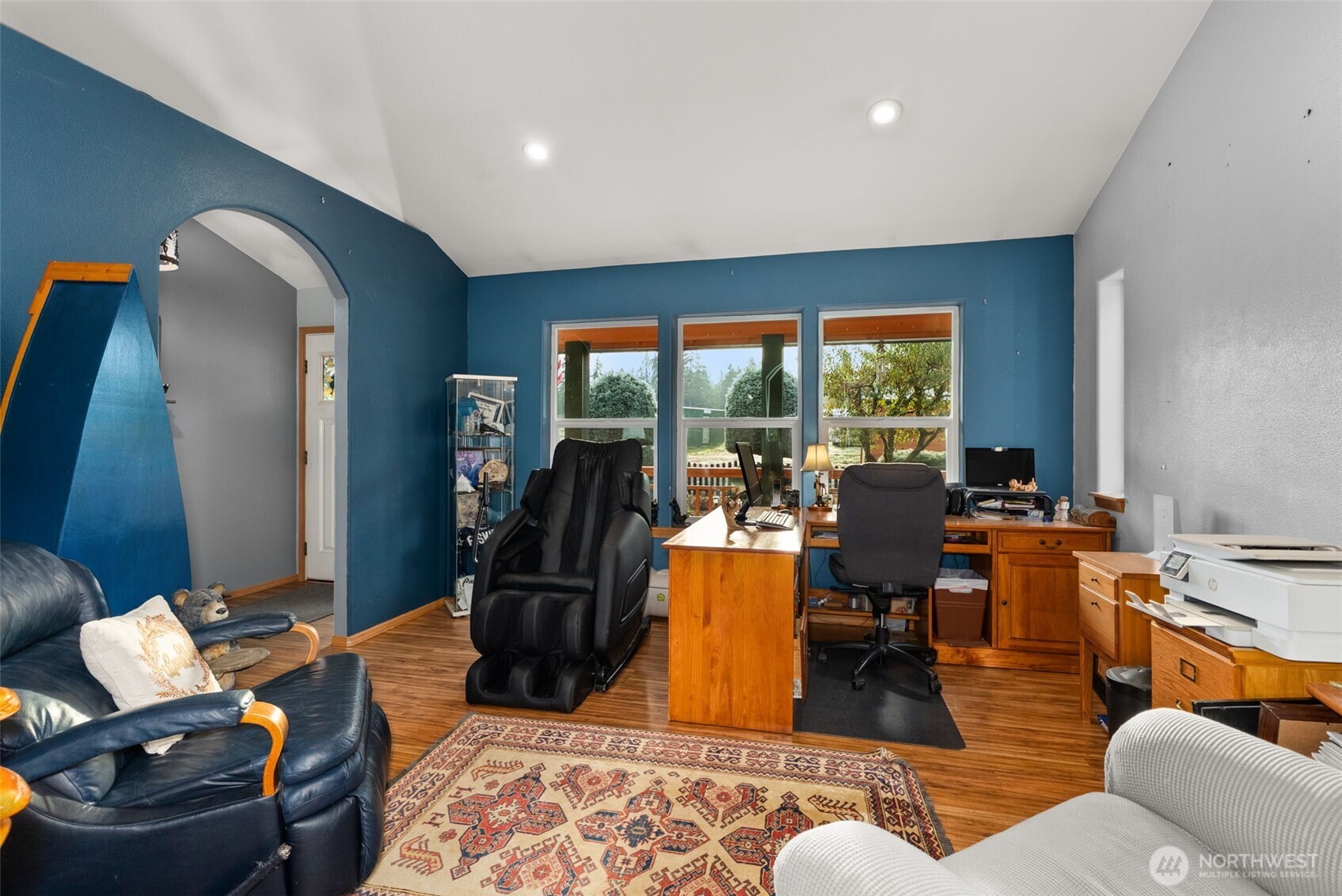 207 Ramsaur Road Centralia, WA 98531 - Photo 22 of 40 a living room with furniture a rug and a large window