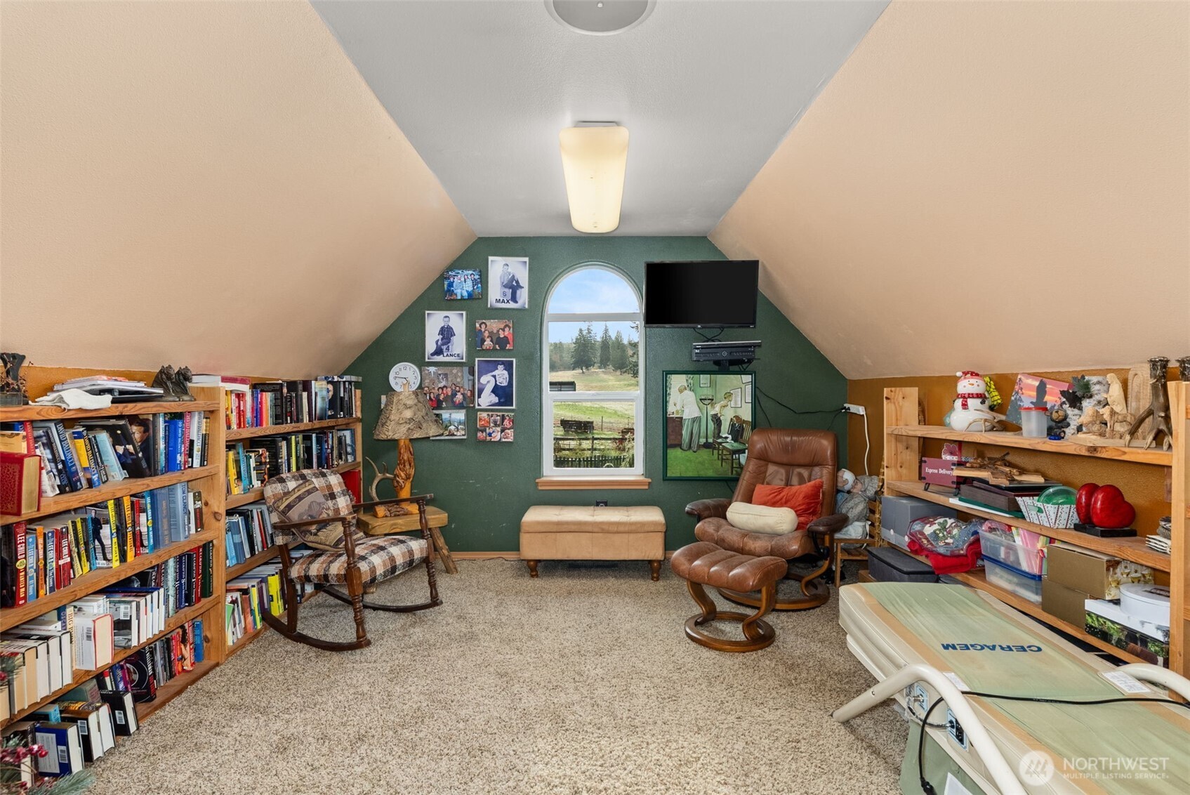 207 Ramsaur Road Centralia, WA 98531 - Photo 23 of 40 a room with furniture toys and a book shelf