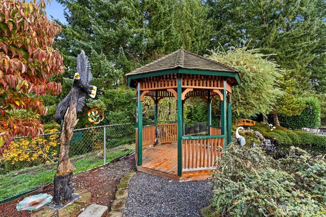 a view of a deck with a yard