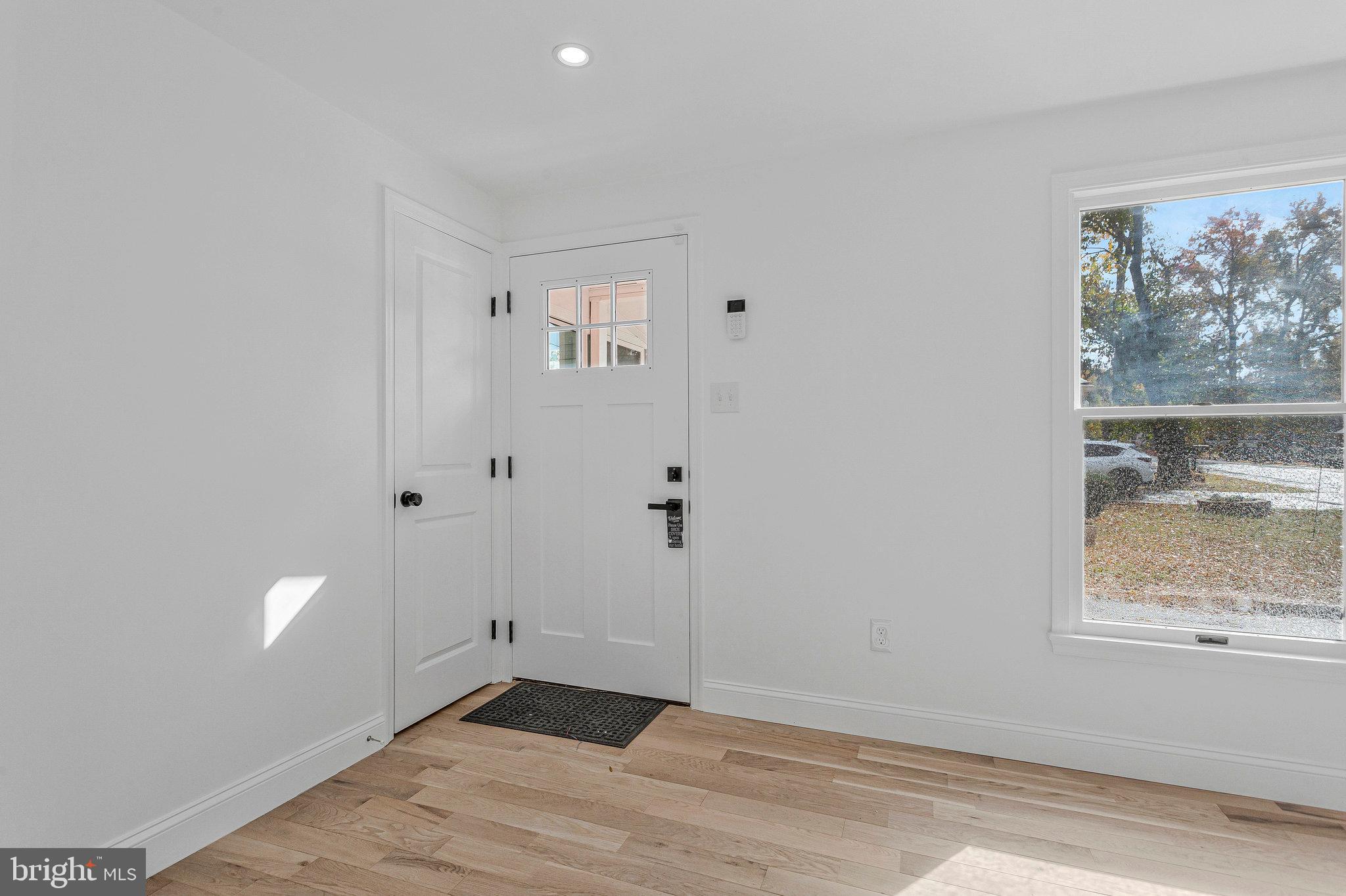 3365 Arundel On The Bay Road Annapolis, MD 21403 - Photo 9 of 48 a view of an empty room with a window