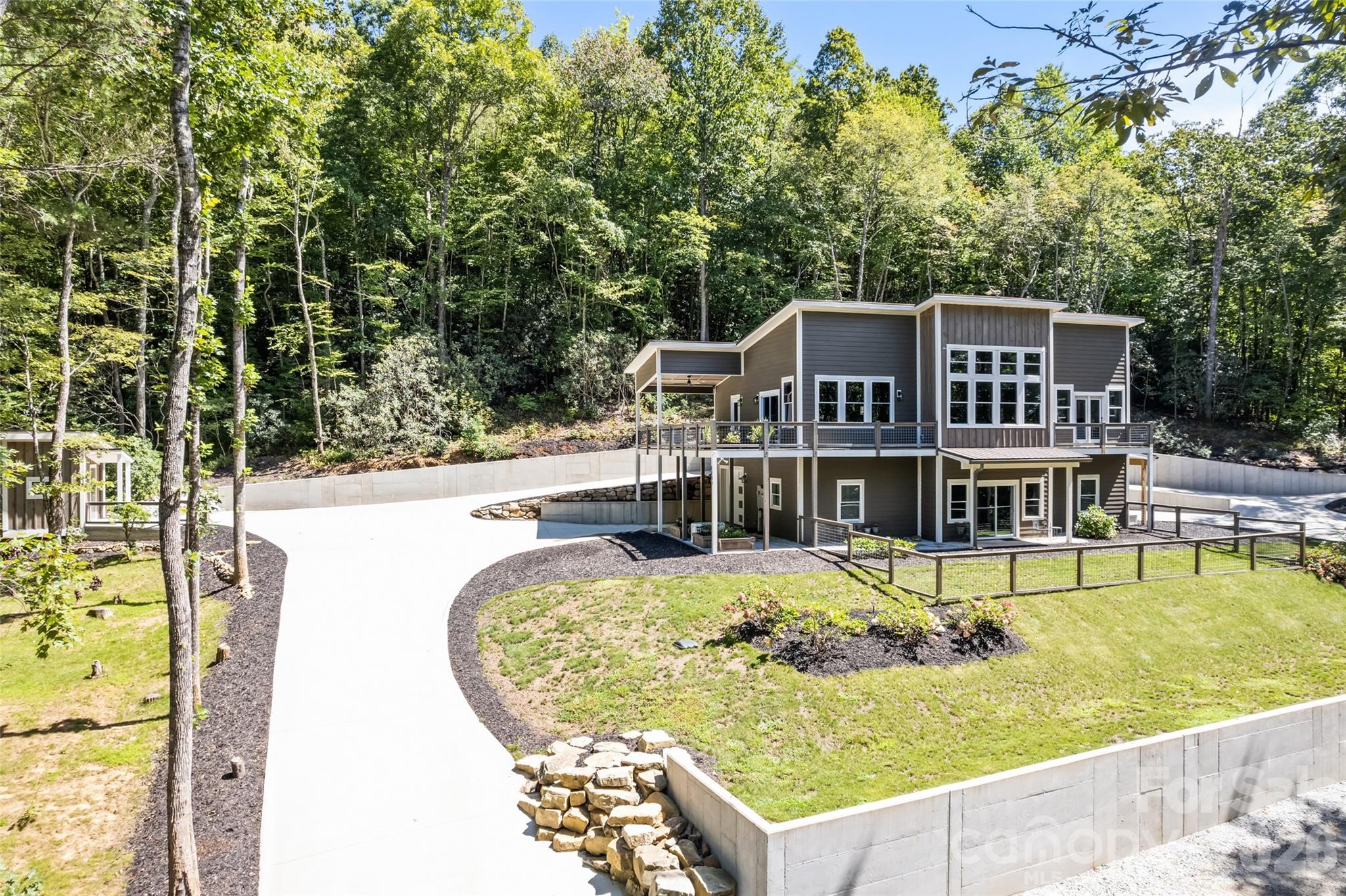 1185 Wallalieu Road Otto, NC 28763 - Photo 38 of 43 a view of a swimming pool with a patio