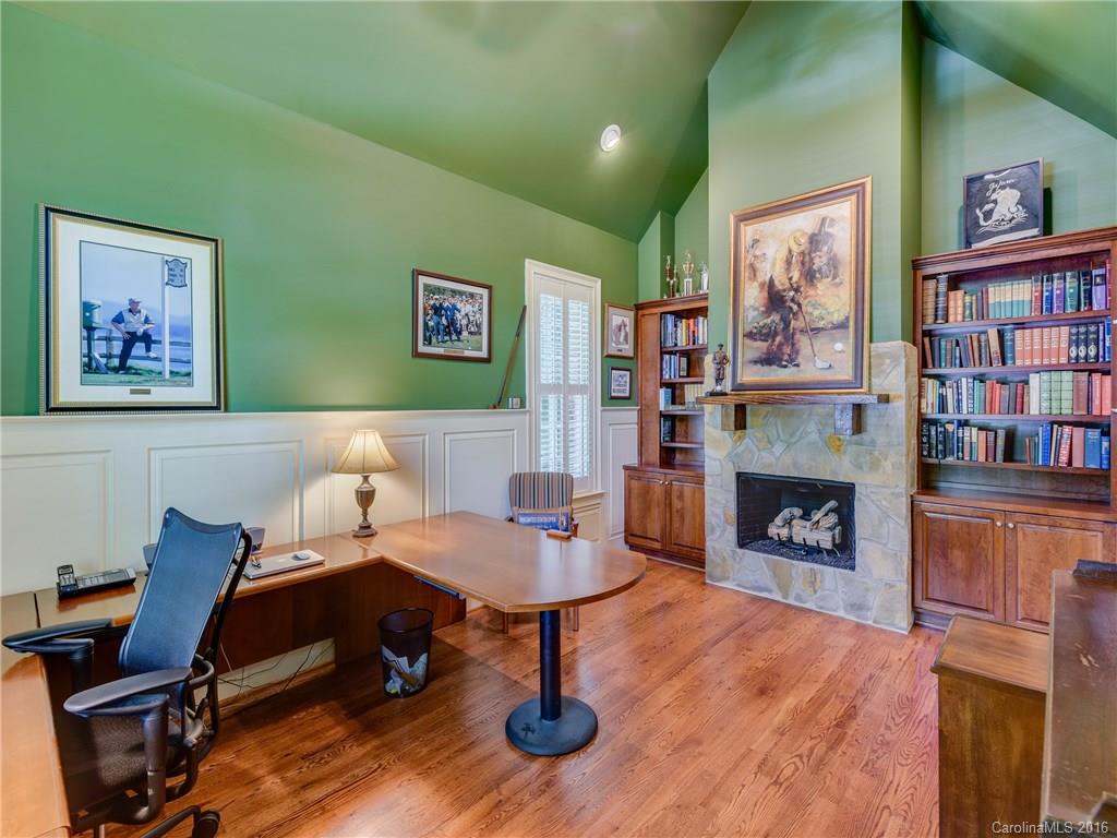 6706 Fox Ridge Circle Davidson, NC 28036 - Photo 12 of 24 a living room with furniture and a fireplace