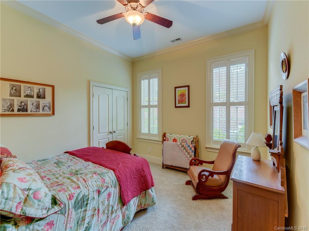6706 Fox Ridge Circle Davidson, NC 28036 - Photo 15 of 24 a bedroom with bed and window