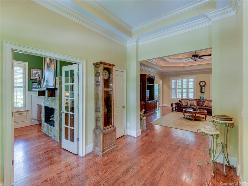 6706 Fox Ridge Circle Davidson, NC 28036 - Photo 3 of 24 a view of a livingroom with wooden floor and furniture
