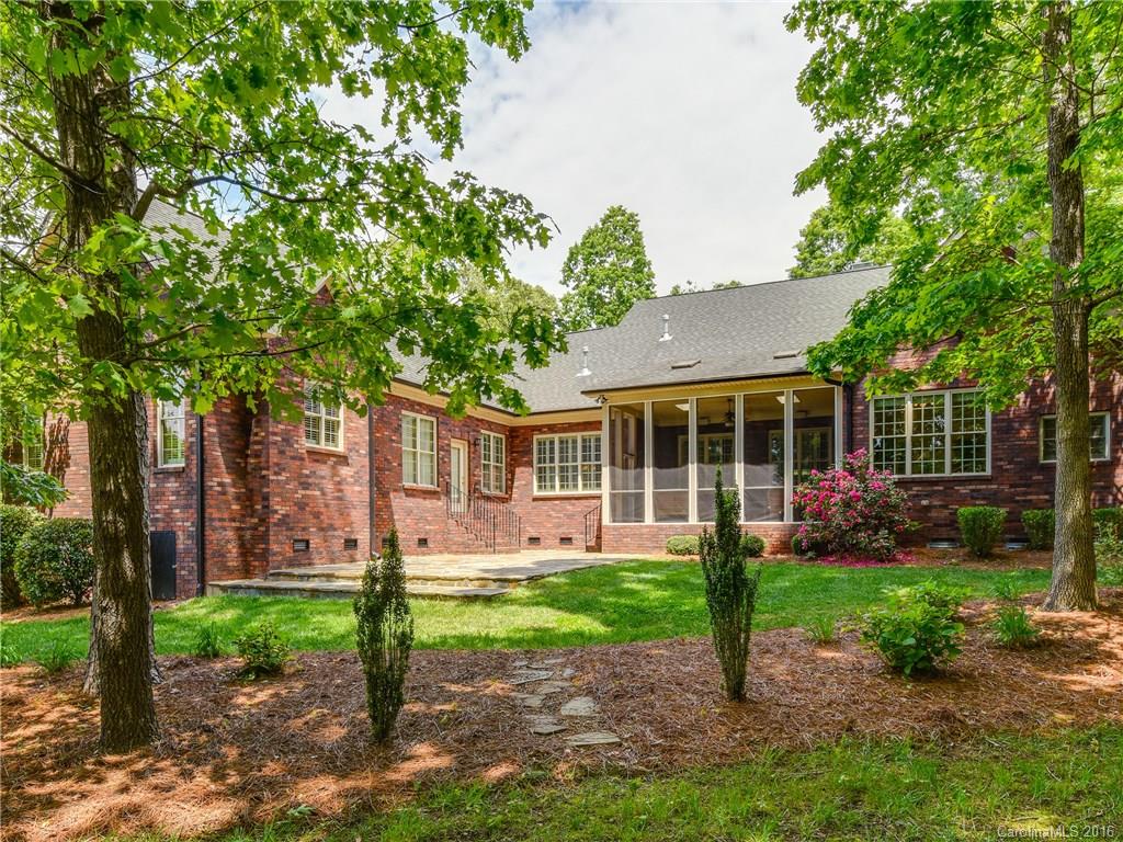 6706 Fox Ridge Circle Davidson, NC 28036 - Photo 22 of 24 a view of a house with a yard and garden